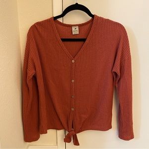 pink knitted long sleeve top